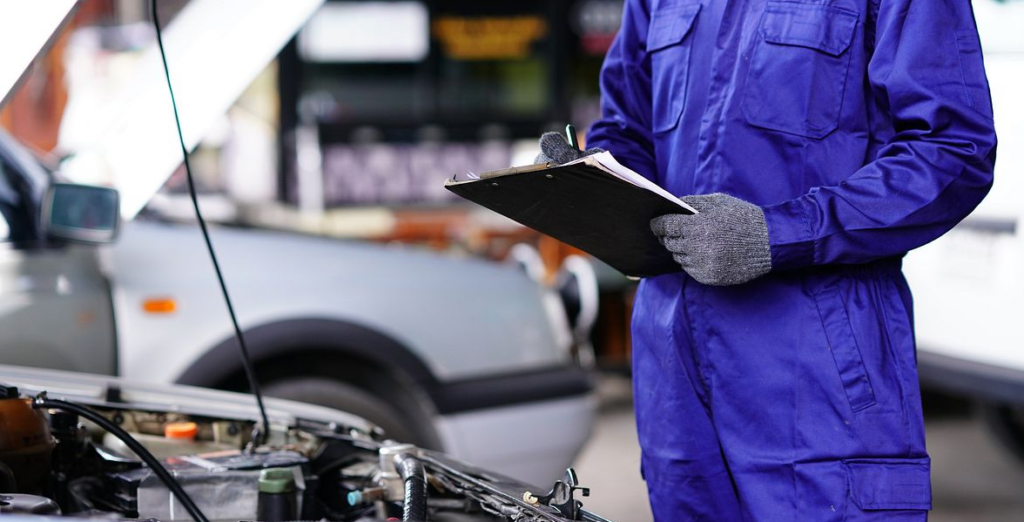 Mechanic with a clipboard