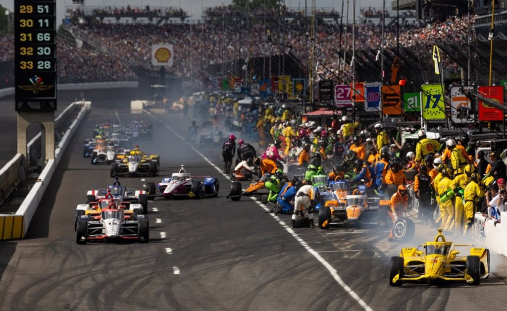 Pit Road Action - 108th Running of the Indianapolis 500 - By Joe Skibinski