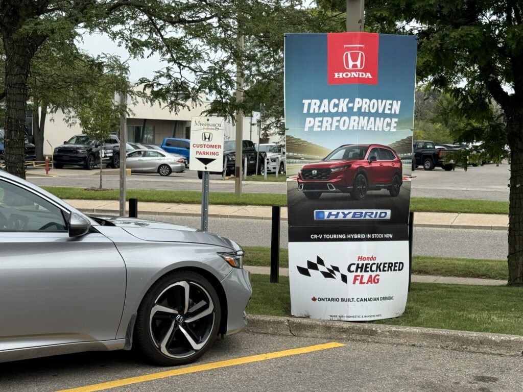 Advertising for the Honda Checkered Flag event at a dealership in Mississauga Ontario