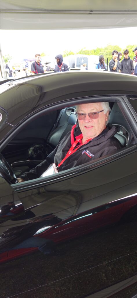 Bruce Hadfield sitting in his Dodge Viper