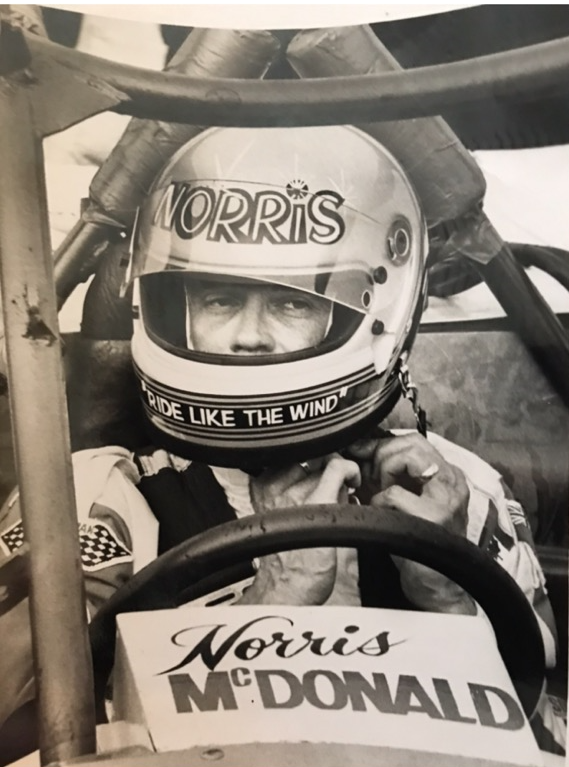 Norris in his racing helmet