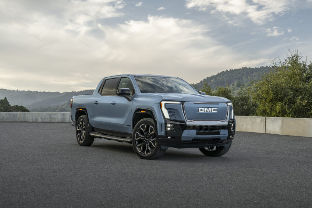 Static front shot of 2025 GMC Sierra EV Denali in Moonlight Matte.