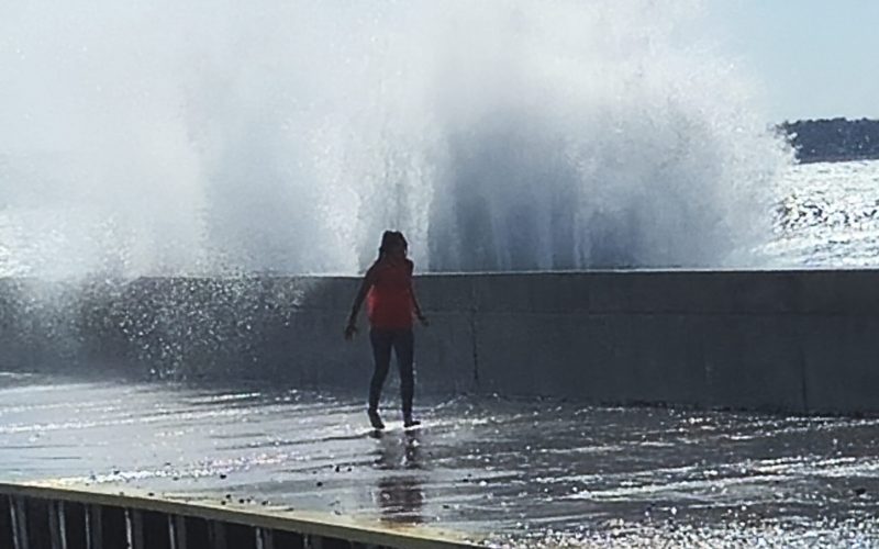 Young person on the pier in Port Elgin Ontario