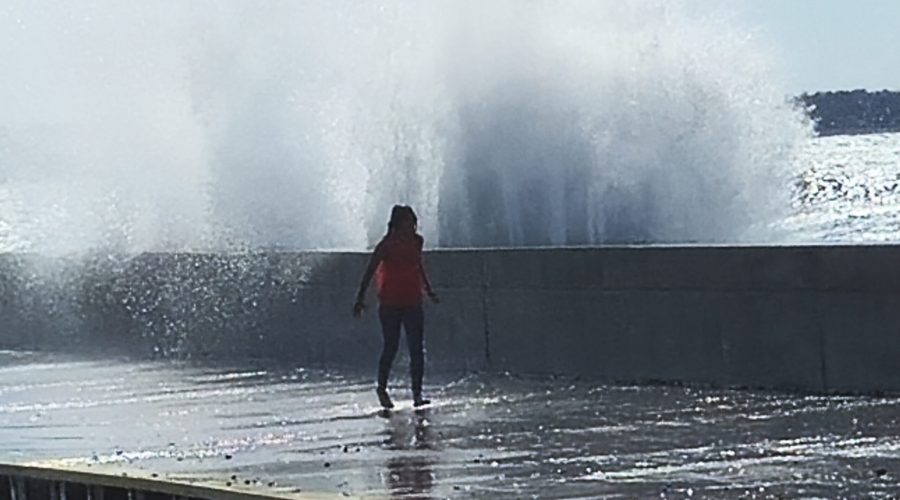 Young person on the pier in Port Elgin Ontario