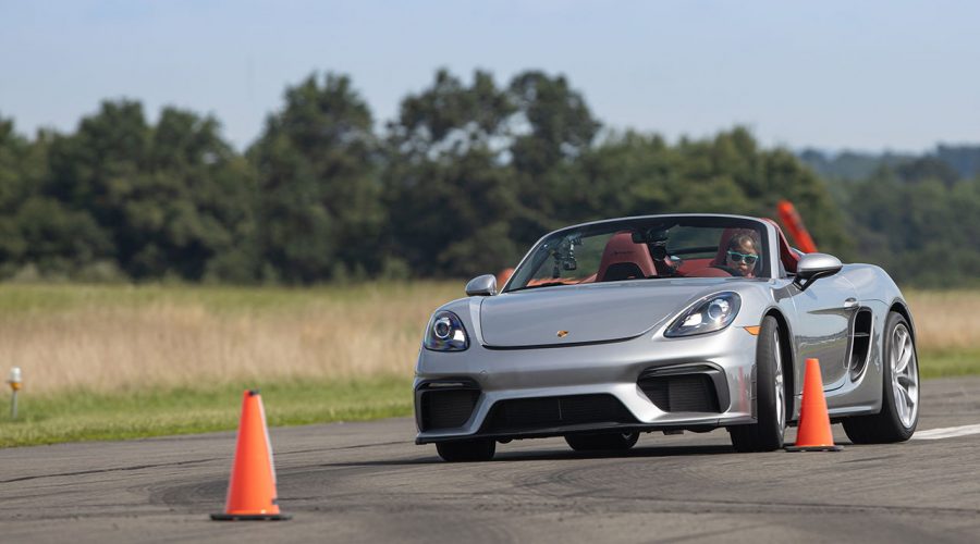 Chloe Chambers driving Porsche 718 Spyder for Guinness World Record in slalom